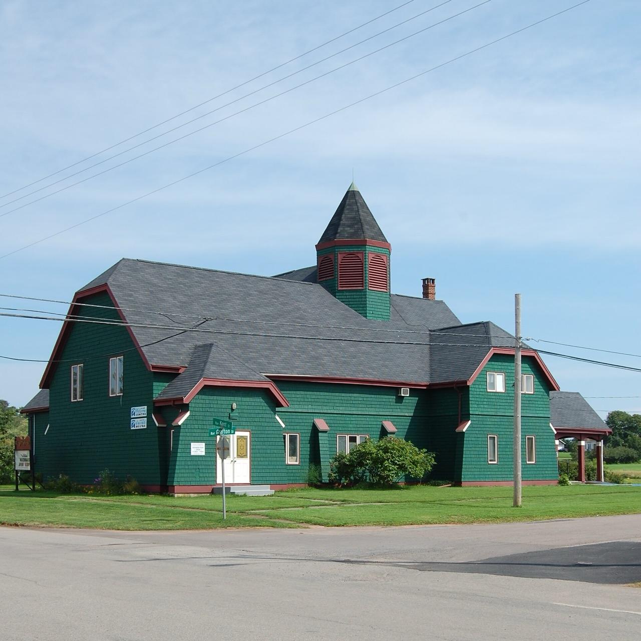 Kings Playhouse in Georgetown, a green shingled theatre with a central tower