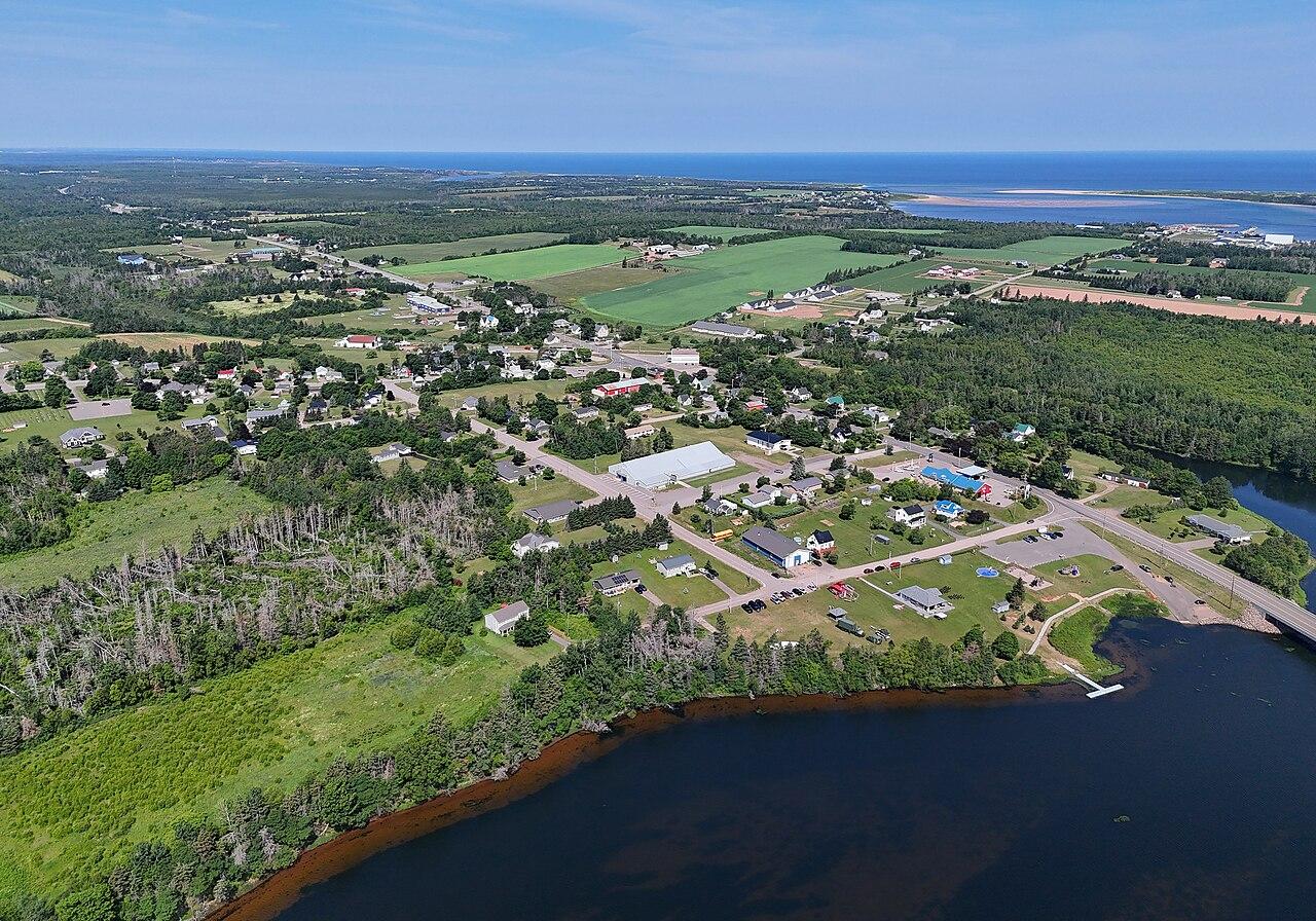 Morell from the air, with the river in the foreground and the Gulf on the horizon
