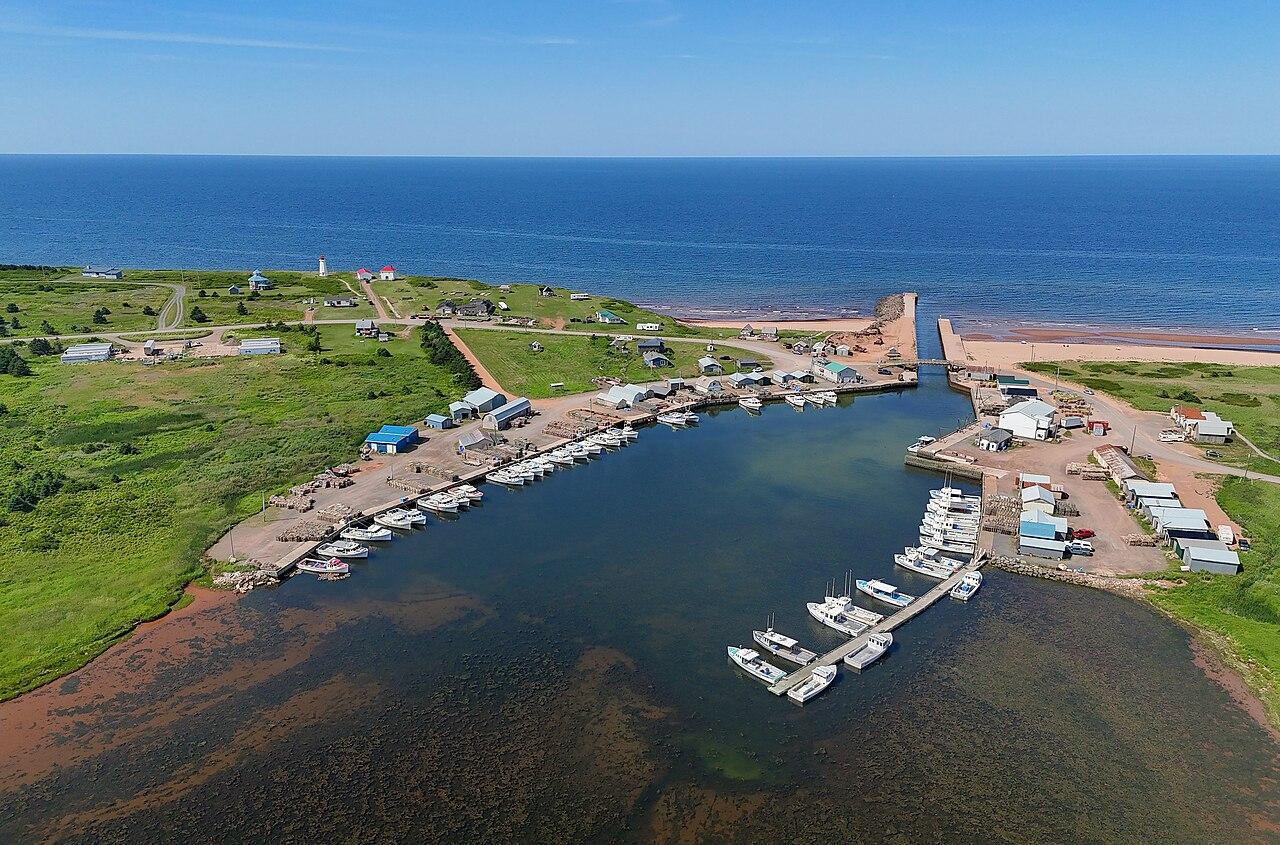 Naufrage harbour from the air, with boats inside the breakwater