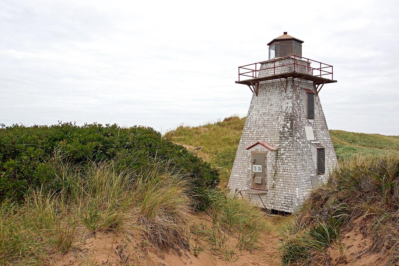 The small white lighthouse in the dunes at St. Peters Harbour